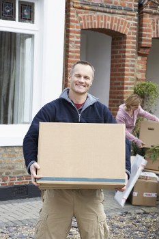 Van and moving boxes representing a clear Merton Man And Van quote process
