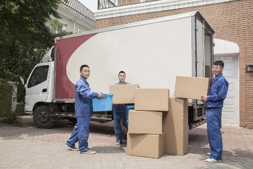 Packed boxes and furniture prepared for a home move in Merton