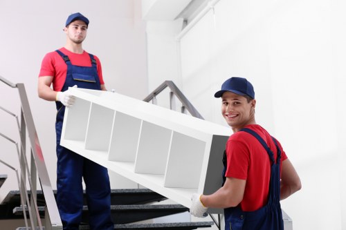 Local man with van loading furniture in Merton