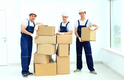 Local office move team handling desks and equipment in Merton