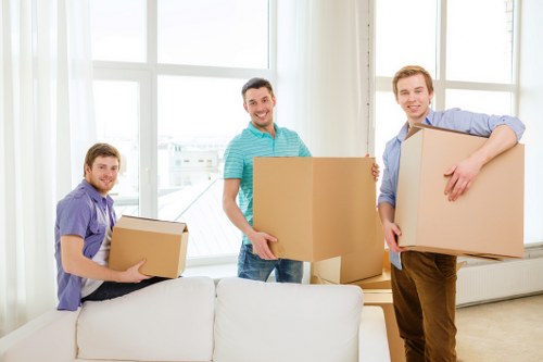 Unpacking boxes and setting up rooms after relocation in Merton